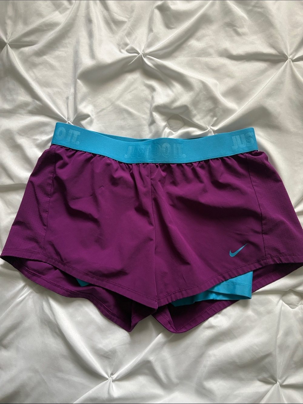 Nike Women’s Purple Athletic Shorts with Teal Waistband